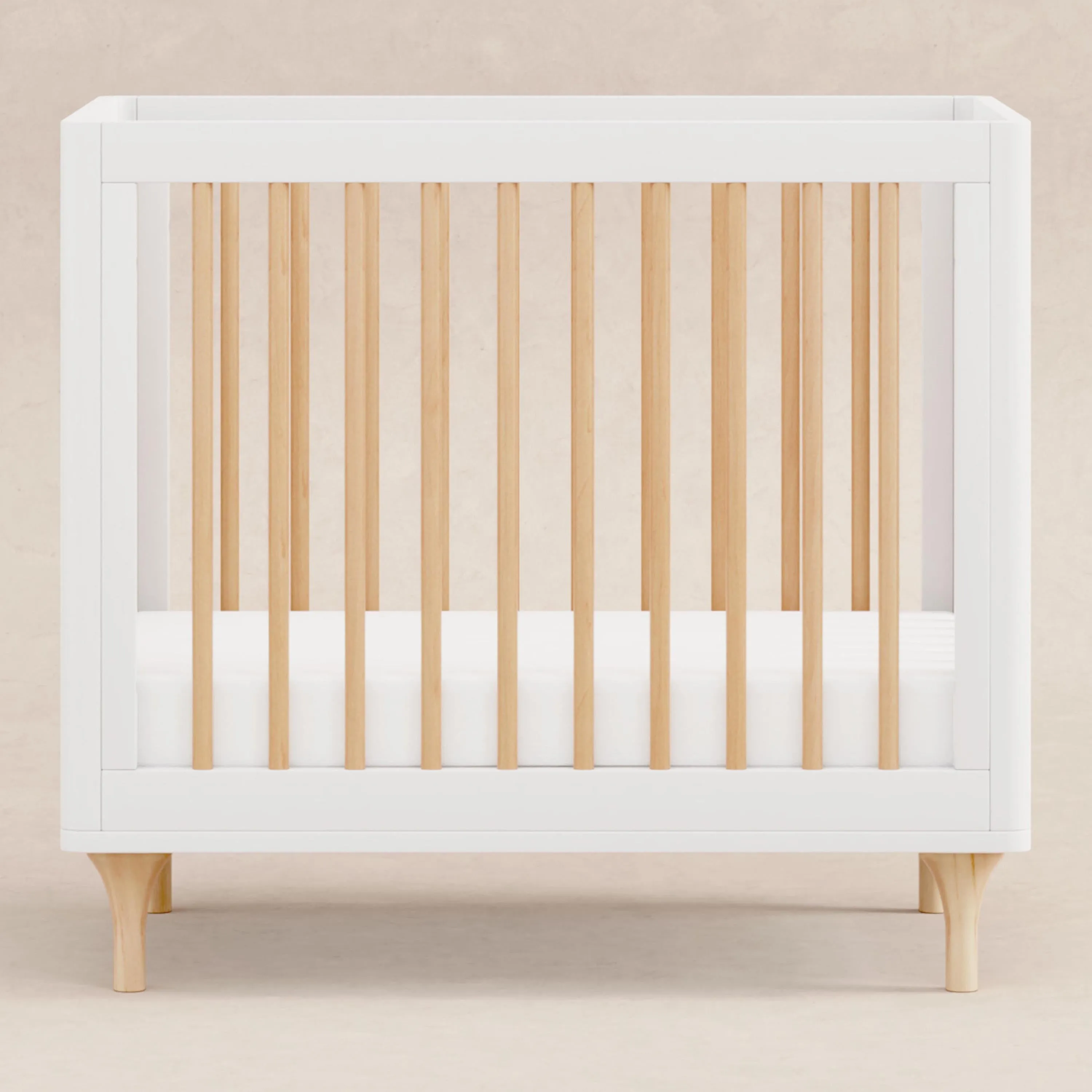 Lolly 4-in-1 Convertible Mini Crib and Twin Bed with Toddler Bed Conversion Kit